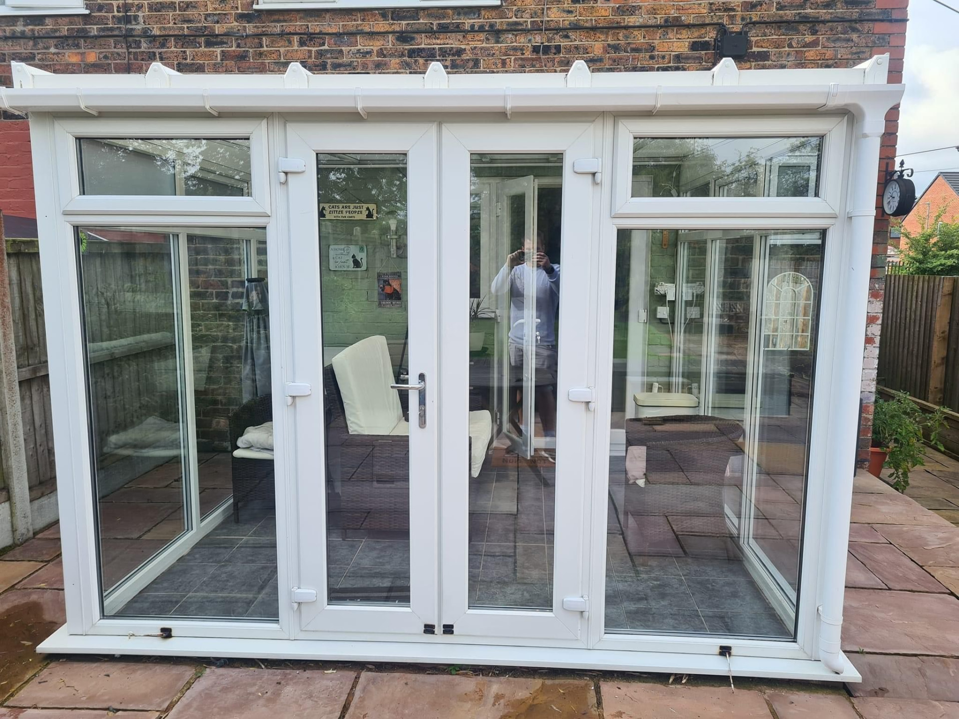 White uPVC French doors opening into a conservatory in Stoke-on-Trent